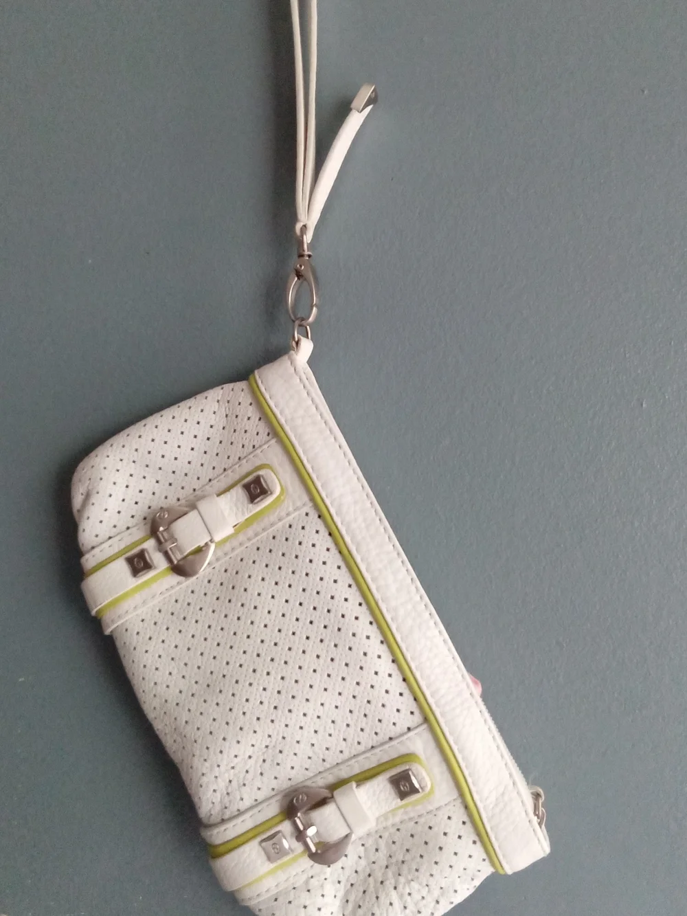 White Perforated Faux Leather Wristlet Clutch with Lime Green Trim and Buckles